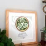 Framed Celtic spiral artwork with Irish proverb about death, honoring a loved one with a green and gold triskelion design and memorial verse.