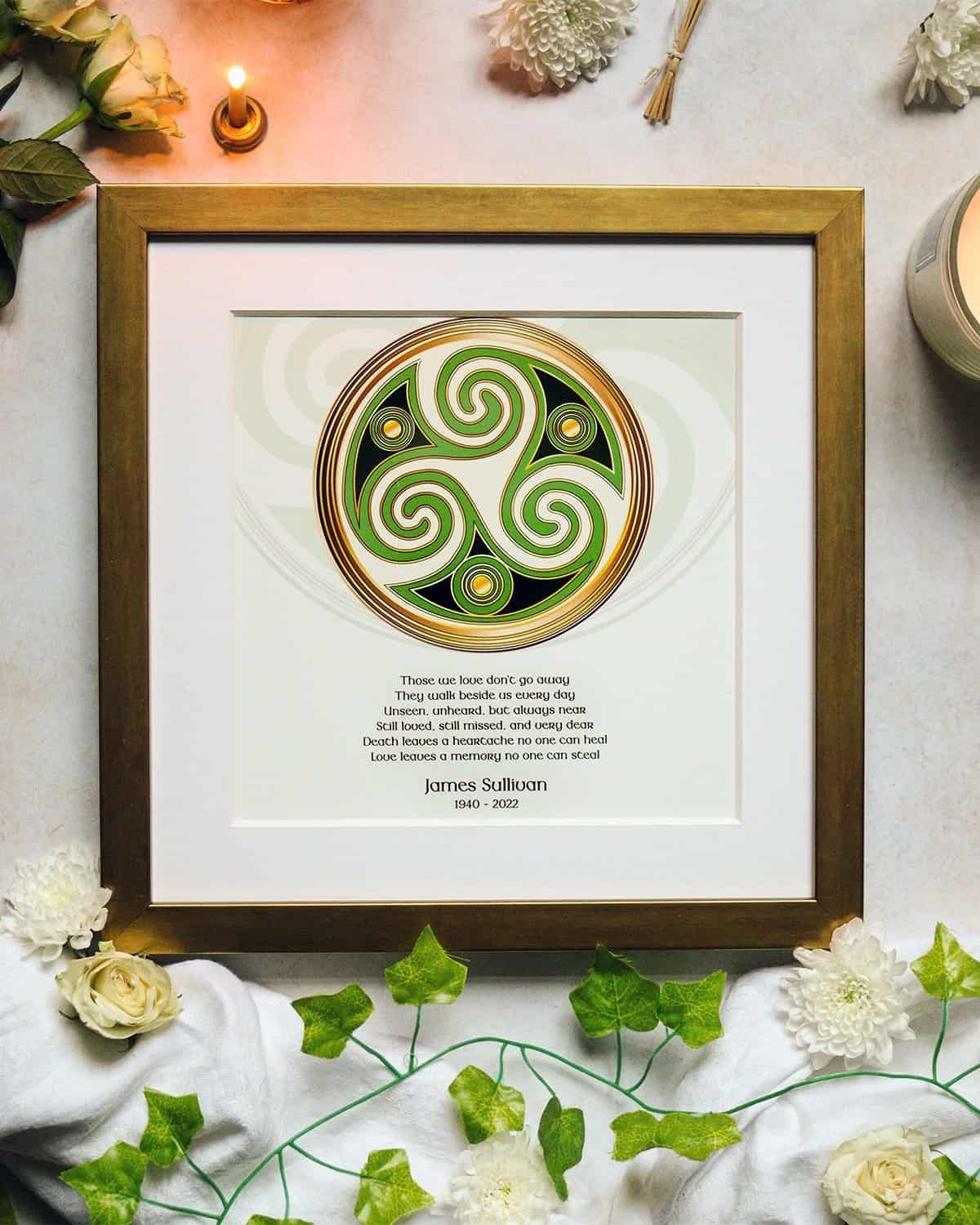 Framed Irish sympathy gift featuring a Celtic triskelion design with a heartfelt personalized memorial poem, surrounded by soft roses, ivy, and candlelight