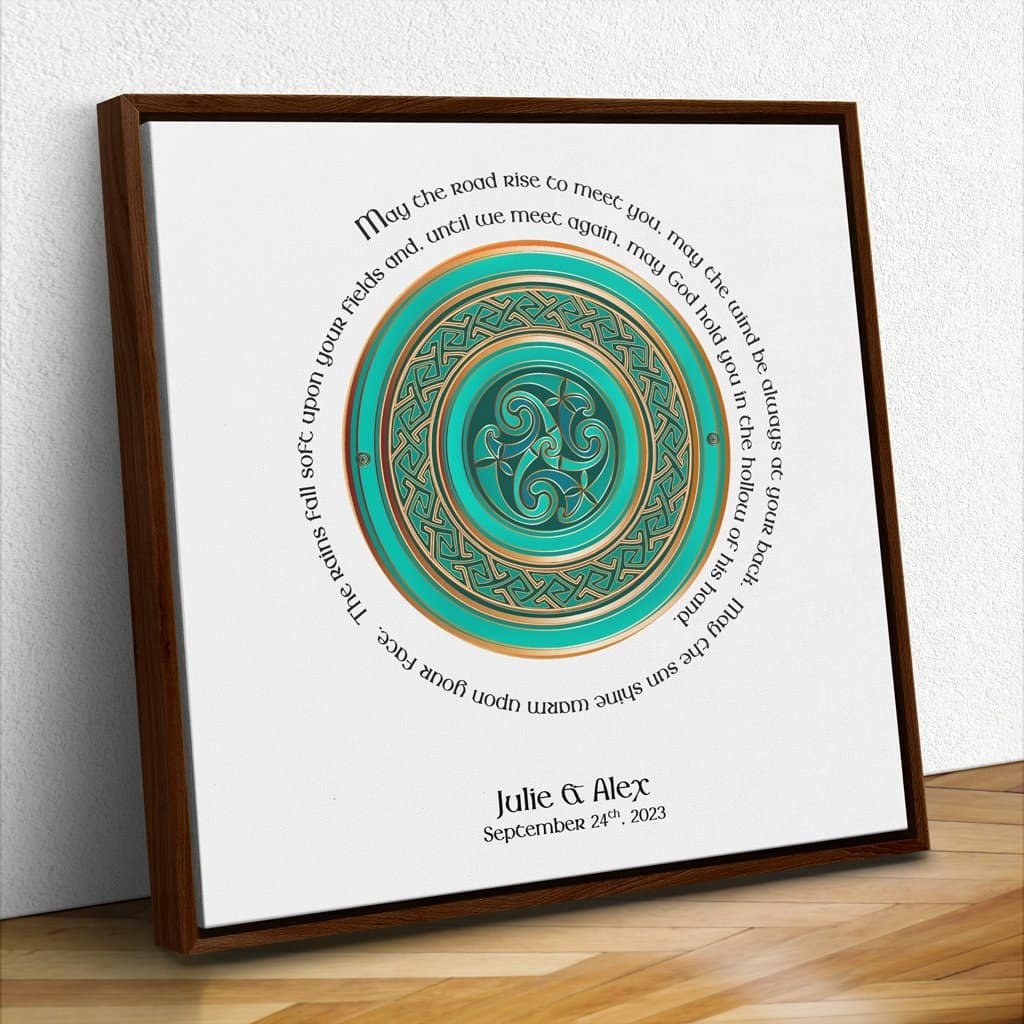 A beautifully framed Irish blessing print featuring the May the Road Rise to Meet You quote, surrounded by an intricate Celtic knotwork pattern in teal and gold.